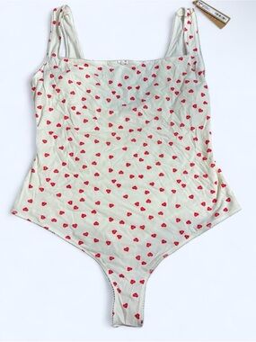SKIMS Cream Bodysuit with Red Heart Motif